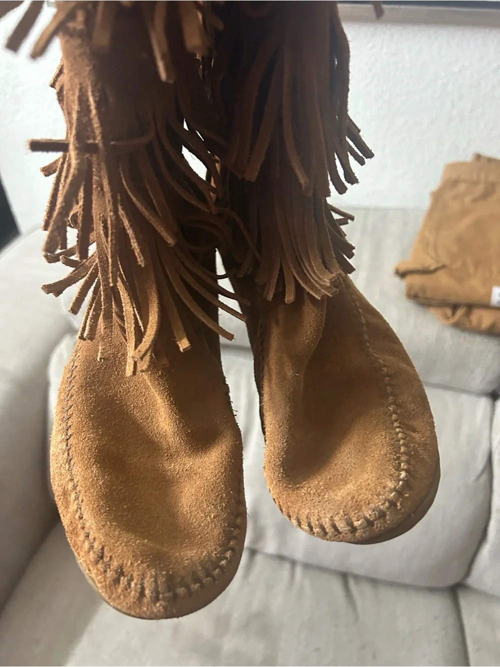 Minnetonka five tier fringe boots women's size 10